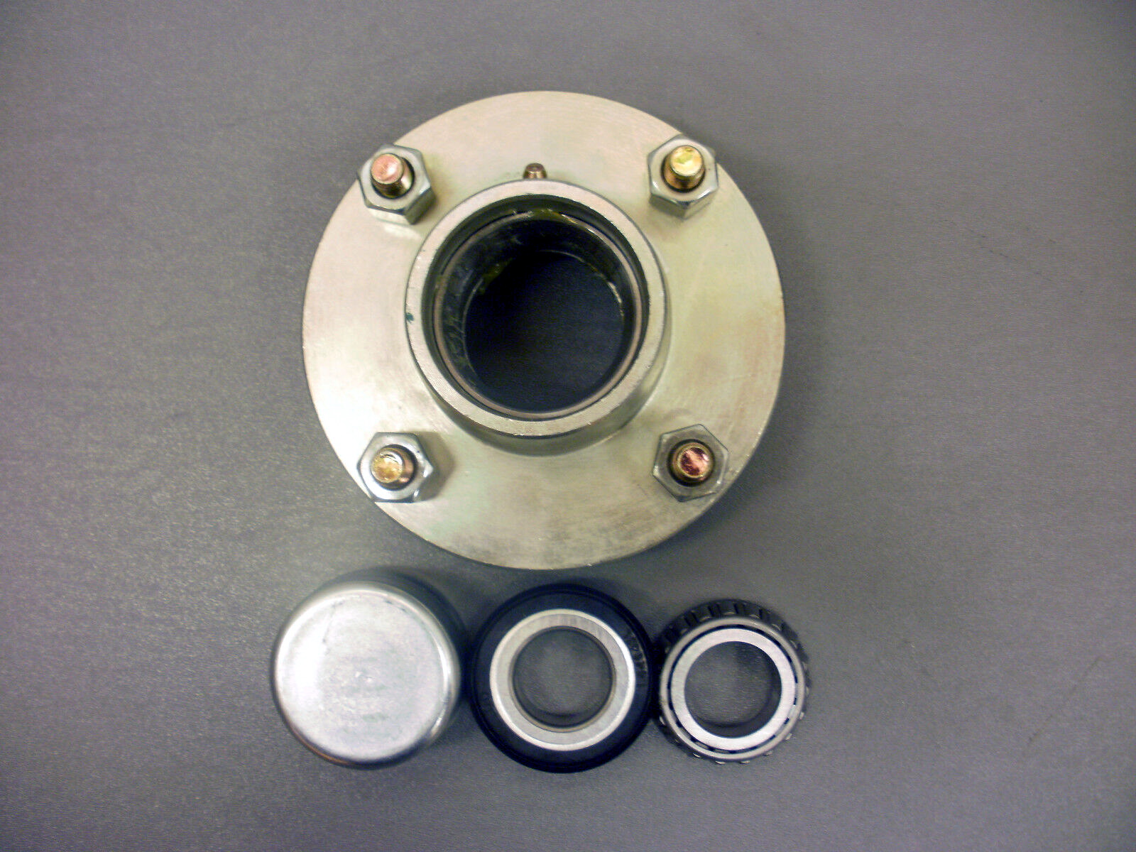 Genuine KnottAvonride 4″ PCD Hub C/W Bearings and Metal Hub Cap The