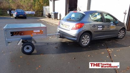 Erde 122 small camping trailer on car