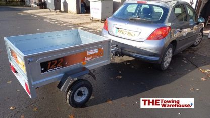 Erde 122 small camping trailer attached to 207 car